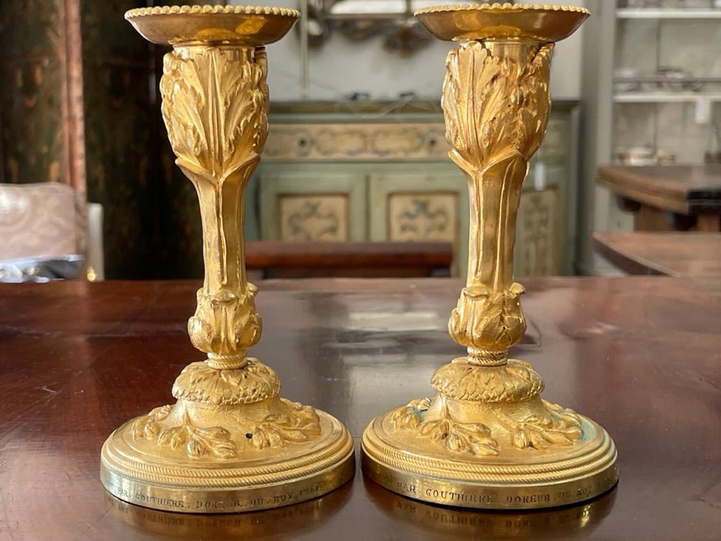 A rare pair of Louis XV gilt bronze candlesticks signed P. Gouthiere - Helen Storey Antiques