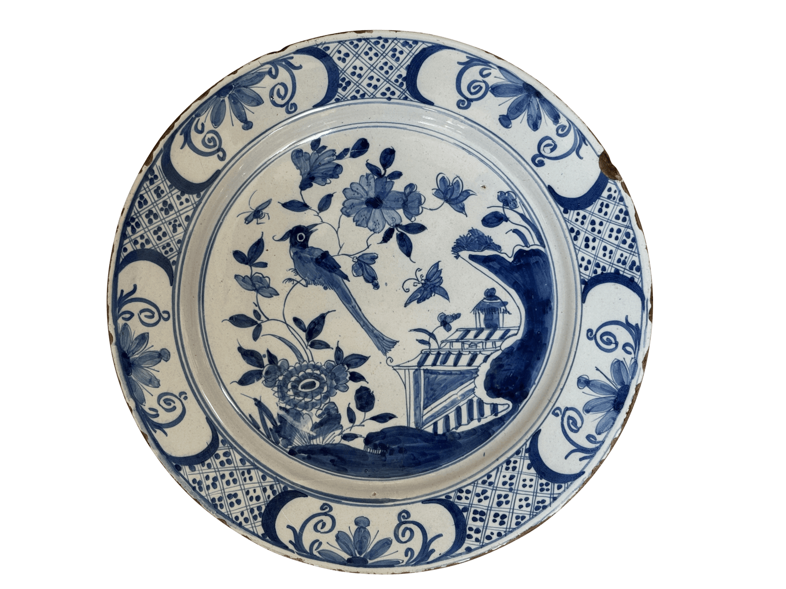 Fine English delft charger featuring a chinoiserie garden scene