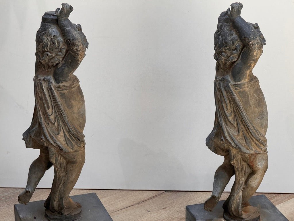 Pair of 18th - century English lead putti - Helen Storey Antiques