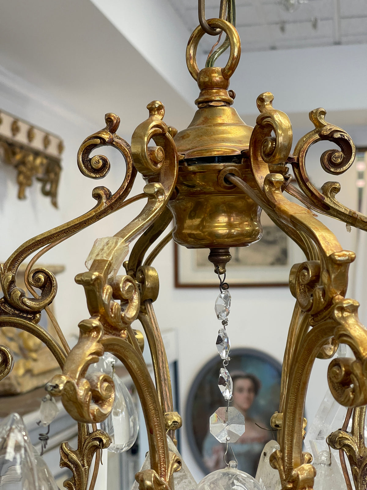 Small French Louis XV style gilt bronze and rock crystal eight light chandelier