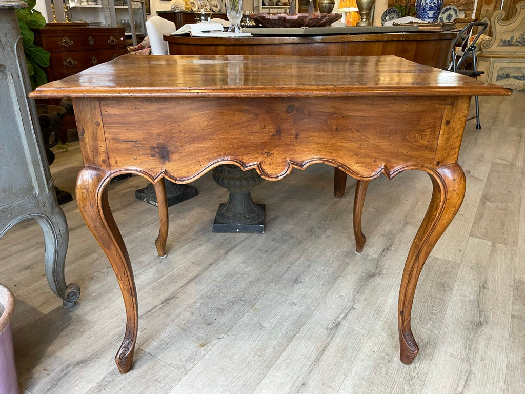 FRENCH PROVINCIAL CARVED WALNUT TWO DRAWER TABLE CIRCA 1800